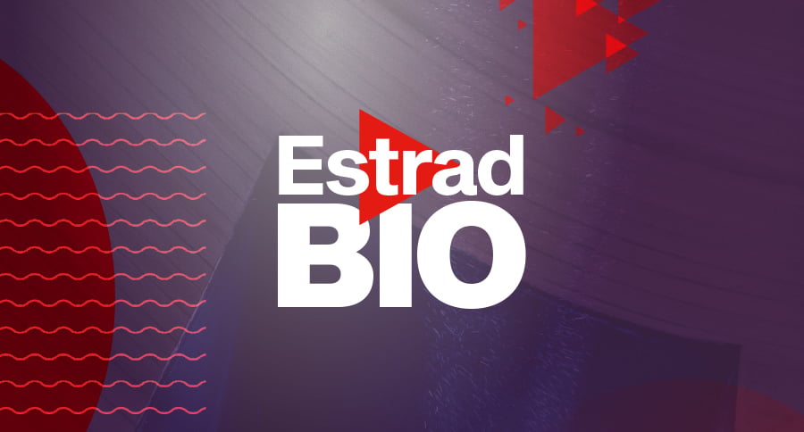 Vit text Estrad Bio ovanpå en lila och röd bakgrund.